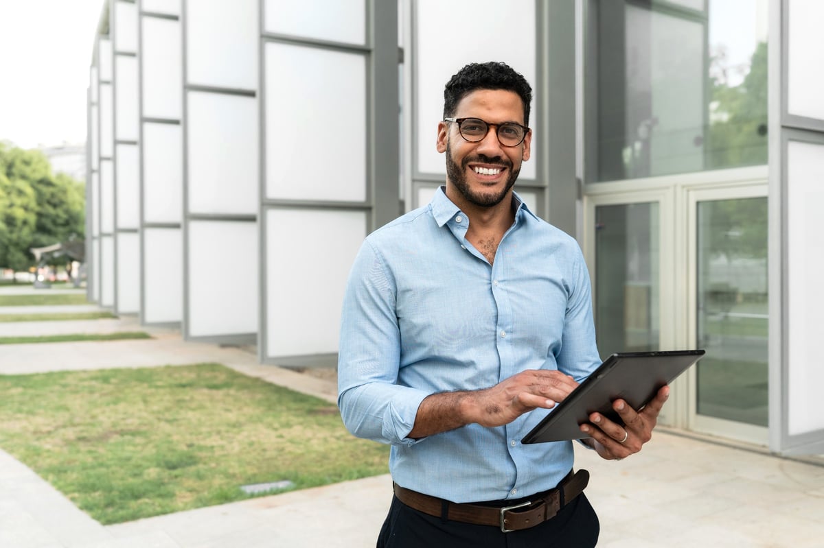Property owner reviewing rental performance on a tablet
